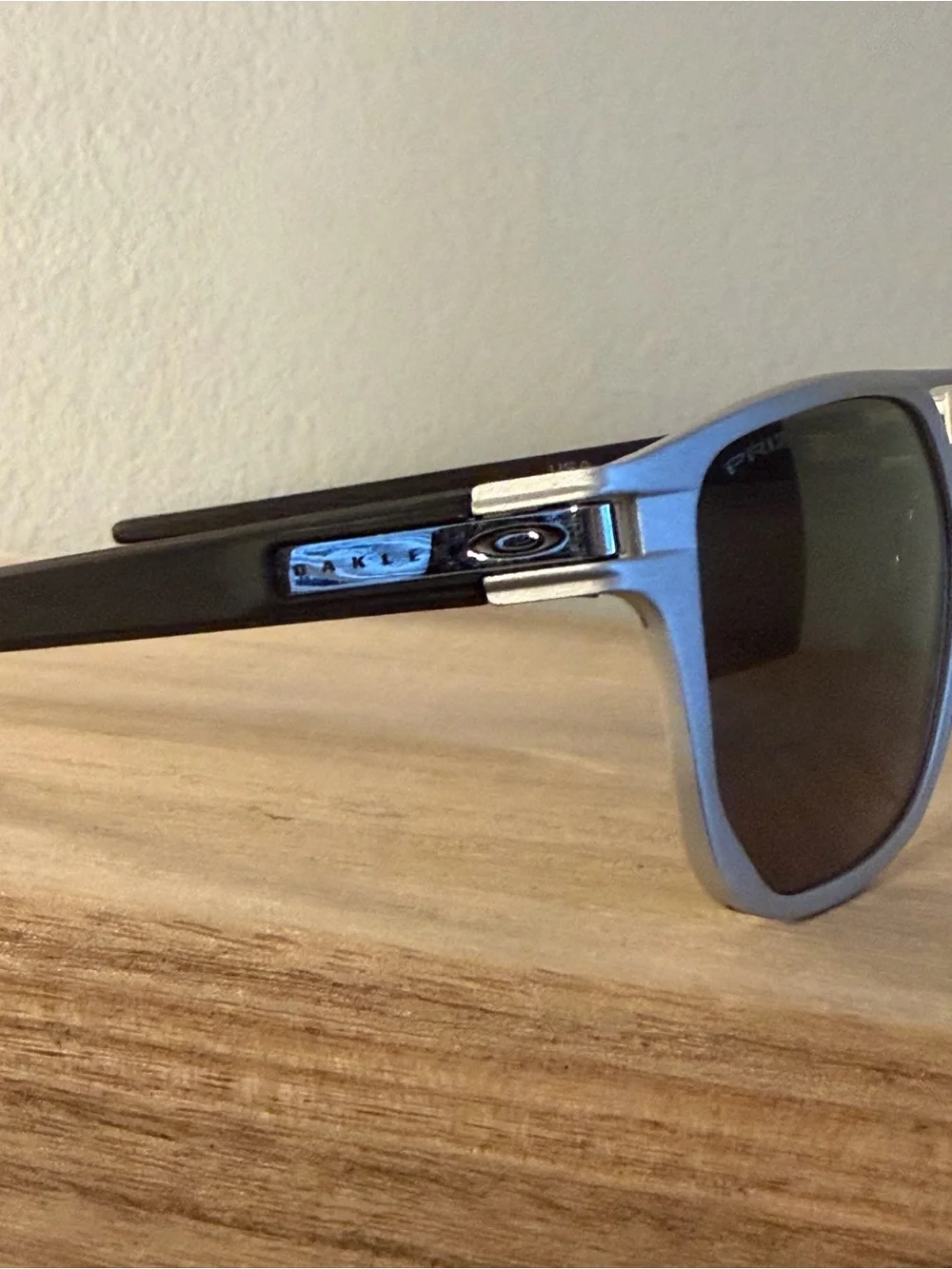 Oakley Latch Alpha Silver Framed Sunglasses with Dark Lenses